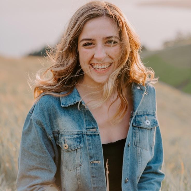 Kaveri Mehta, Lead Design Curator at StudioMosaic, reviewing corporate floral arrangements